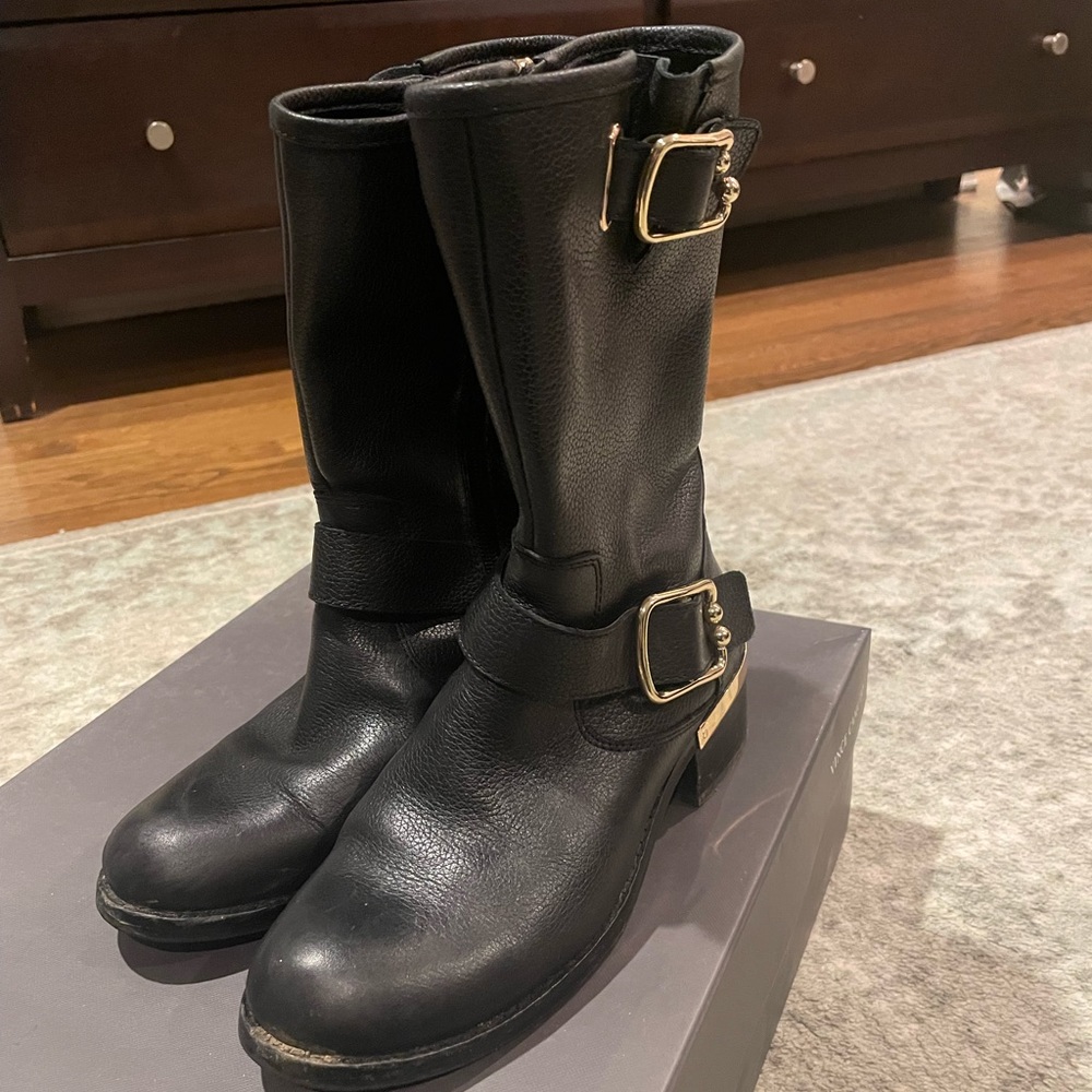 Size 7 excellent used condition Vince Camuto black booties with gold hardware.